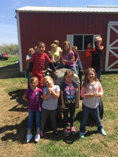 Kids enjoying the outdoors at the farm